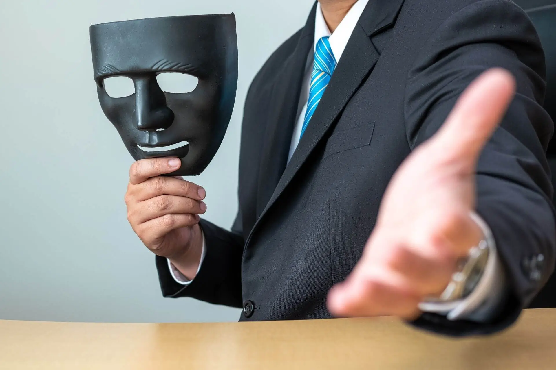 Image depicting a scammer